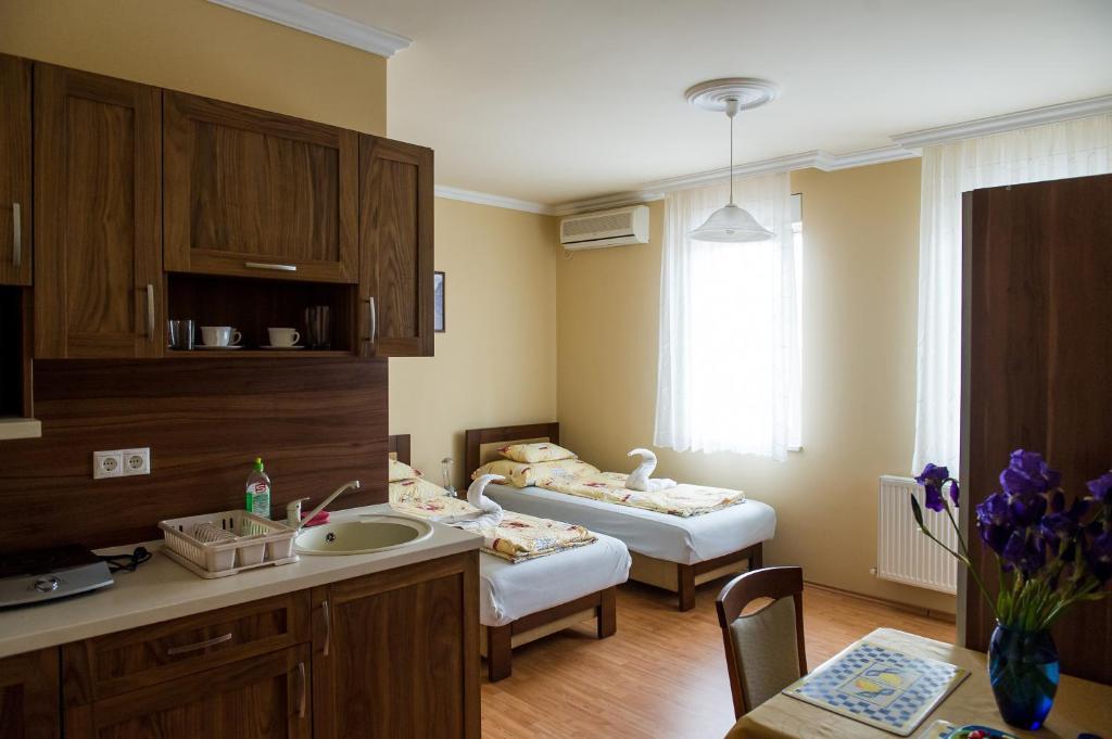 Aura Apartman ハイデゥソボスロー 部屋 写真