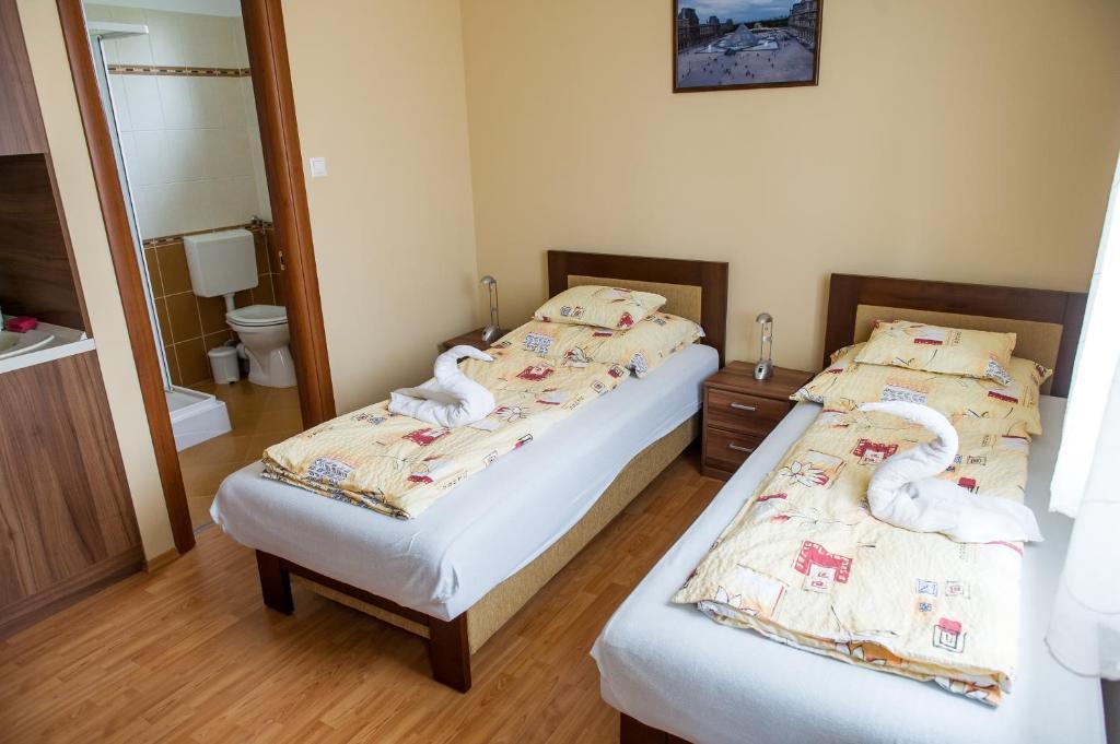 Aura Apartman ハイデゥソボスロー 部屋 写真