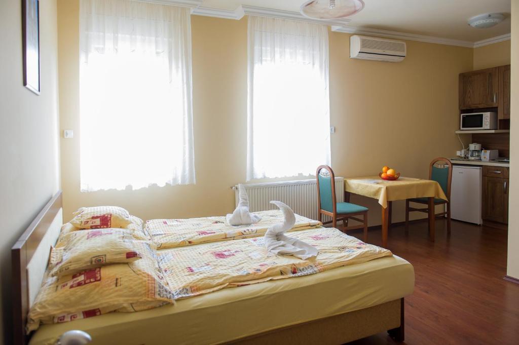 Aura Apartman ハイデゥソボスロー 部屋 写真